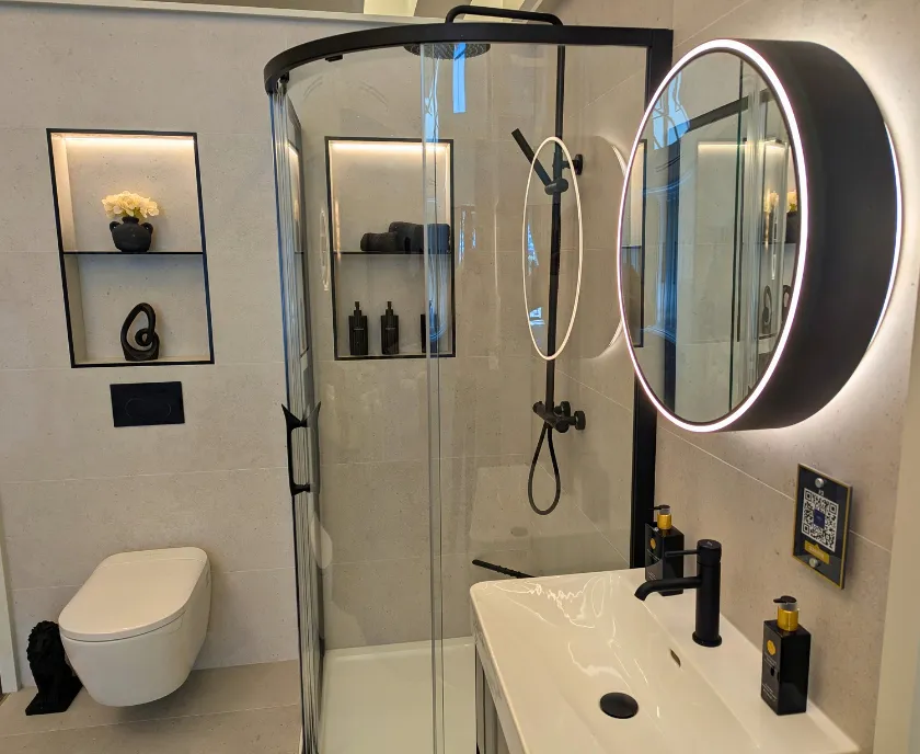 Illuminated Niches & Repeated Black Finishes